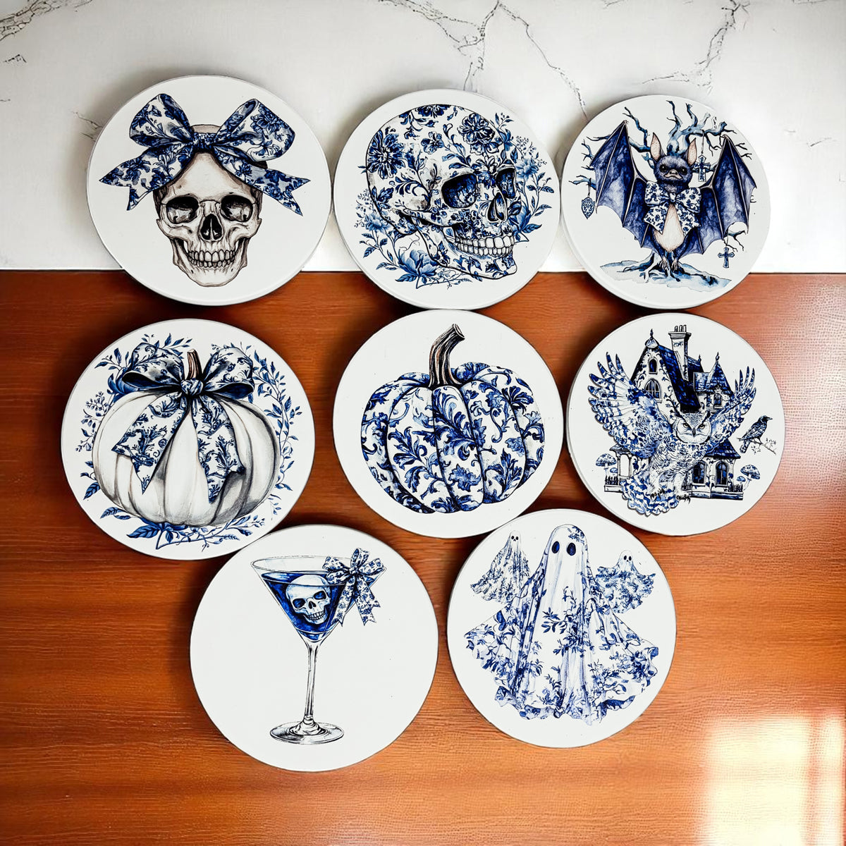 Designer Halloween coasters arranged in grid pattern showing all 8 chinoiserie designs
Blue chinoiserie skull martini cocktail coaster with cork backing on white surface
Elegant ghost design coaster in blue and white chinoiserie pattern